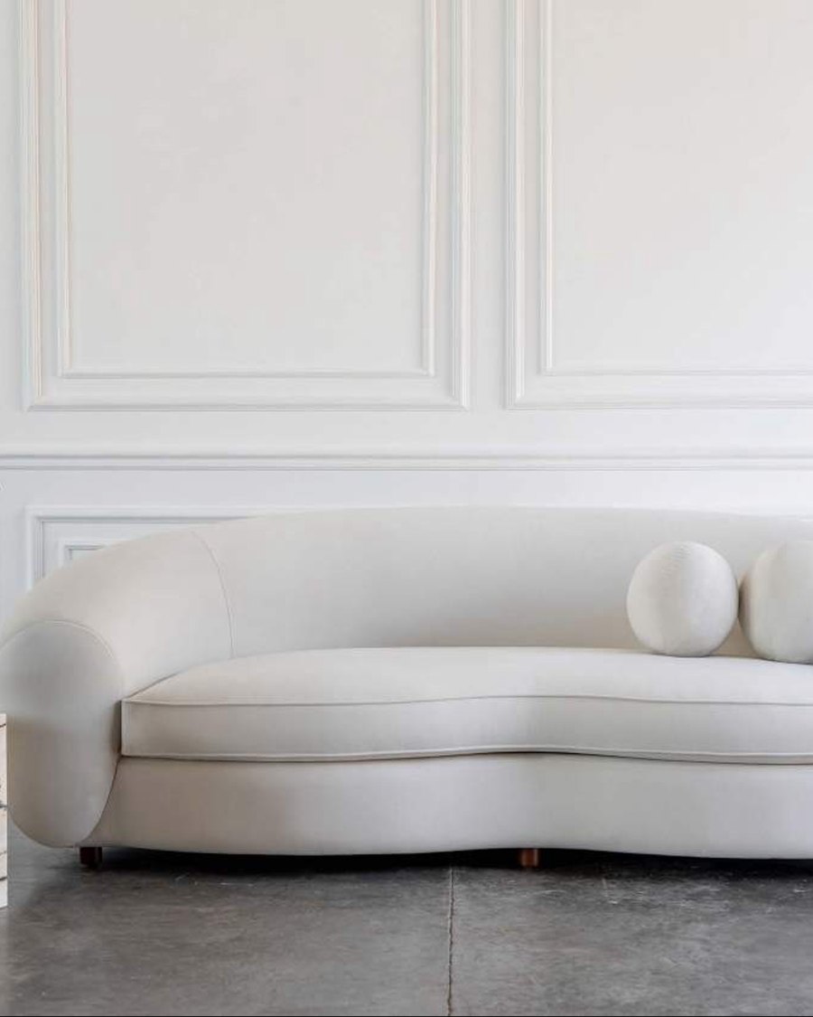 Wall paneling behind a bespoke sofa